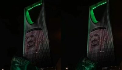 برج المملكة يتزين بصورة خادم الحرمين الشريفين واللون الأخضر بمناسبة اليوم الوطني.. فيديو