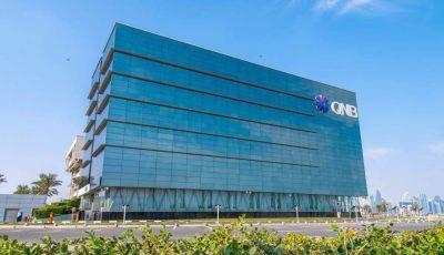 مجموعة QNB تُحذر من احتمال حدوث اضطرابات عالمية نتيجة اختلالات مرتبطة بالاقتصاد الأمريكي